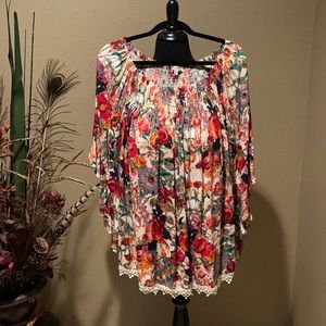 Long tunic style blouse.